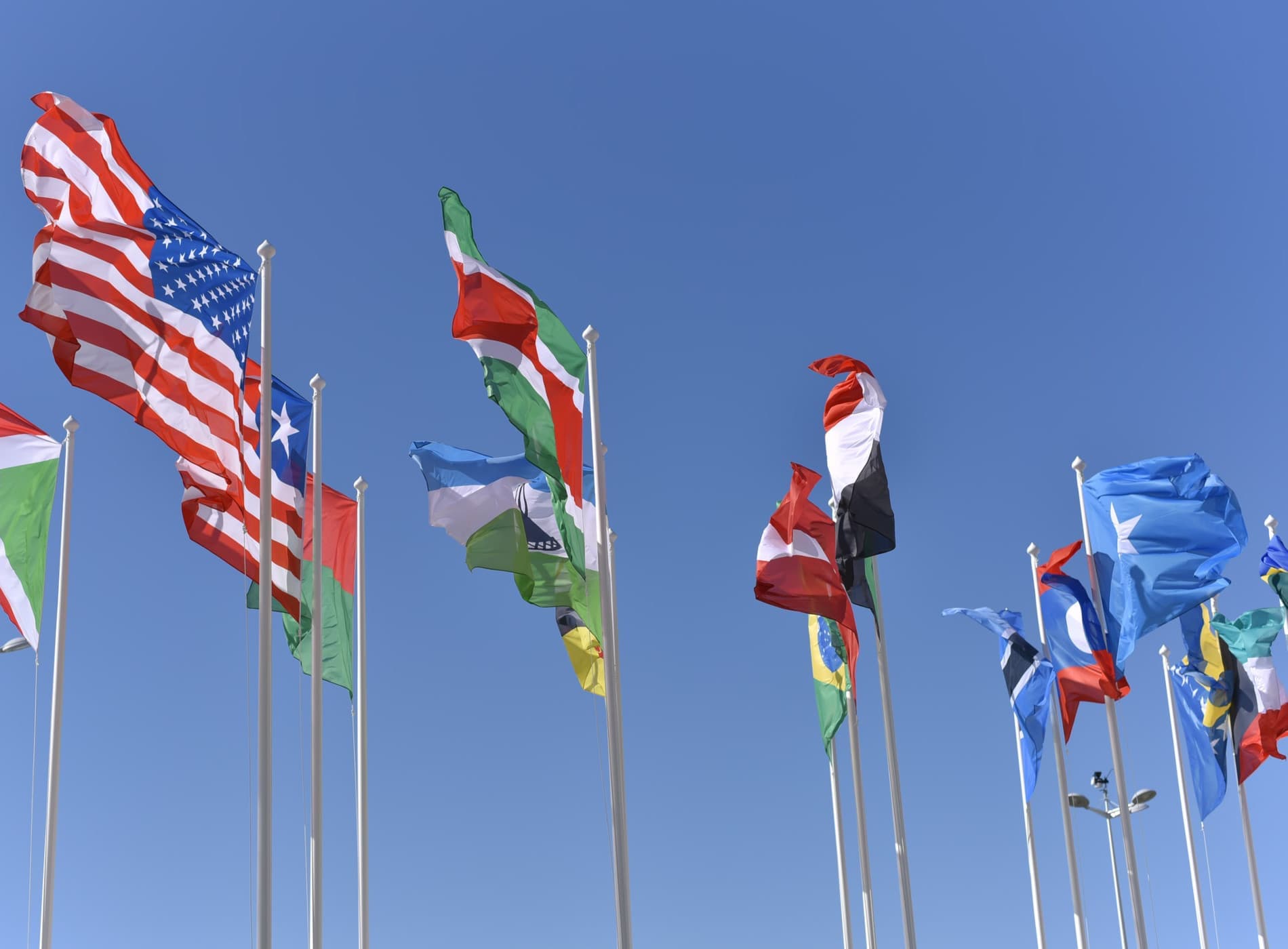 Two smiling women at a beach